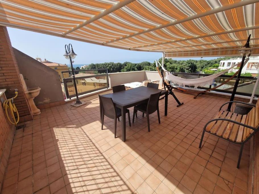 Terrazza A Nettuno E Chiesa Giubilare Santa Maria Goretti Esterno foto